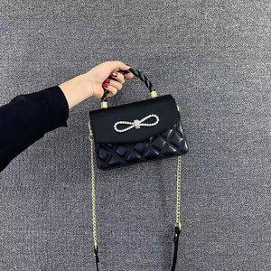 2023 Women's Classic Clamshell Bag Designer Bag All Black Metal Plaid Matilas Chain Crossbody Bag axel lyxig stor kapacitet handväska handväska crossbody väska