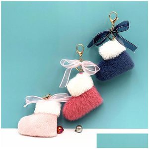 Julstövlar Keychain Faux Fur Keychains Söt bågsäck Pendant Key Holder Cartoon Plush Car Keyring Women Presenttillbehör Drop Delivery