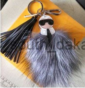 Nyckelringar Luxury Fluffy Karl äkta Raccoon Fur Pompom Monster Bag Bugs Charm Keychain Plush Key Ring Leather Tassel Pompom X0914