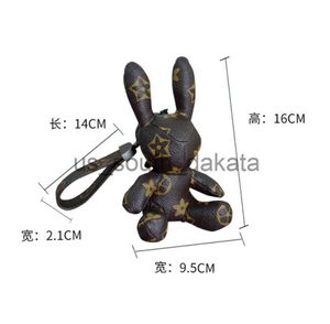 Key Rings High-end Designer Cartoon Rabbit Car Key Rings Bag Pendant Charm KeyChain Jewelry Grid Flower Printed Holder Women Men Fashion Lea2582 x0914