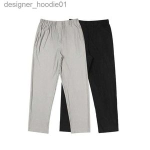 Męskie spodnie solidny kolor plisowane Homme Plisse Pants Mężczyźni Kobiety Joggers Dripstring Spodnie Sweat L230915