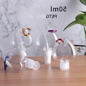 Garrafa recarregável de álcool plástico de coração de amor vazio 50ml Garrafas transparentes transparentes de desinfetante para mãos PET com gancho de chaveiro fácil de transportar Prpow