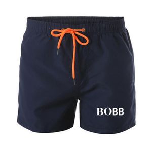 Marca impressa shorts masculinos estilo respirável correndo roupas esportivas para homens casual verão elástico de secagem rápida calças de praia swimsuit2774