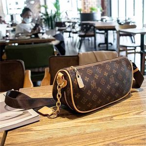 50% de desconto na liquidação Wanghong Jiaozi Cintura Nova Moda Seio Avançado Sentido de Ocidentalização Banda Larga Um Ombro Crossbody Bolsa Feminina Maré modelo 542