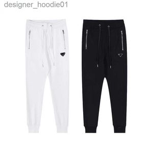 Męskie spodnie 2022 Męskie Projektowanie ścieżek Casual Men Black Grey Joggers Pant Fashion Hip Hop Elastyczne talia Spodnie sportowe L230915