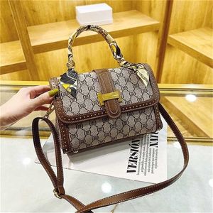 50% de desconto na liquidação 2023 nova bolsa feminina moda versátil bolsa de ombro único mensageiro simples viajante bolsa quadrada pequena modelo de moda 258