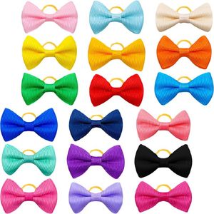 Cão vestuário 50 pçs cabeça de animal de estimação flor pequenos acessórios hairbands bonito filhote de cachorro arcos decoração grooming cães meninas tecido bowtie tamanho