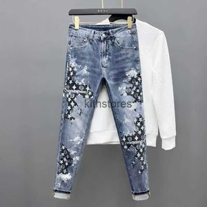 Moda męska noszenie dżinsów mody 2023 Super gorący wzór drukowania szczupłe dżinsy Net Red Spring and Autumn Elasty