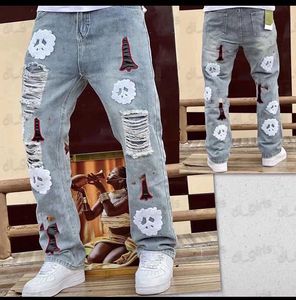 Mäns jeans gata slitage hiphop låg midja lösa kvinnors jeans koreanska modebyxor korsar rak benstil, broderad applikation denim mäns overall jeans