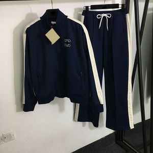 Tute di lusso blu scuro da donna con cerniera pantaloni da giacca tuta sportiva traspirante da esterno set di pantaloni con cappotto morbido al tatto