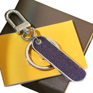 Porte-clés de luxe design unisexe porte-clés en cuir véritable avec porte-clés en acier inoxydable bon nice257k