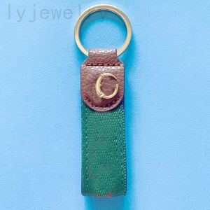 Keychain Designer Bag Small Luxury Keyrings Webbing Green Letter Lanyard Fashion Daily Brown Leather PlatedGold Buckle Key Chain Car Purse Charms PJ055