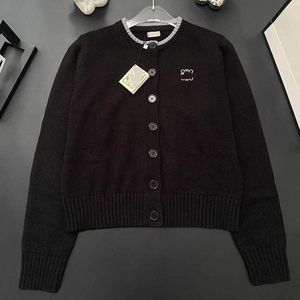 Kvinnors tröjor Wool Sticked Cardigan Jacket för kvinnor i början av hösten Löst montering Rund hals Långärmad tröja Fashionabla och mångsidiga topp