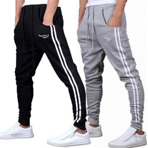 Vår sommarmens byxor mode mager sweatpants herr joggare randiga smala monterade byxor gym kläder plus storlek 3xl harem byxa c285g