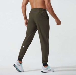 LULULEMEN KVINNOR LULU KORT Pant Yoga outfit jogger sport snabb torr dragkampgymfickor svettbyxor byxor män avslappnad elastisk midja fitness minoritet enkelhet