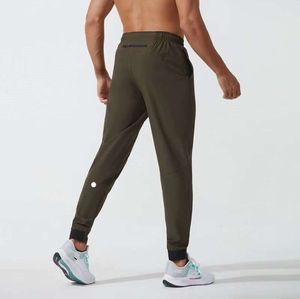 Lululemen Mulheres Lulu Calças curtas Yoga Outfit Jogger Sport Quick Dry Cordão Ginásio Bolsos Sweatpants Calças Mens Casual Elastic Fitness Minoria simplicidade