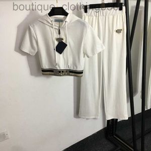 2023 Kvinnor Tracksuits New Sports Set Ribbon Luxury Designer Kort ärm Huva T -shirt Tröja Elastisk midja breda benbyxor
