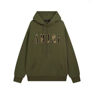 Tasarımcı Amis Erkekler Hoodie 2023 Sonbahar/Kış Yeni Mektup İşlemeli Hip Hop Peluş Peluş Kapşonlu Kazak Unisex Batch Yüksek Kaliteli Havalı Yakışıklı Erkekler Moda Hoodie