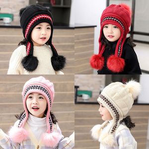 Berretti con pompon lavorati a maglia per bambini con fodera calda 3-12 anni Berretto da neve per cappello invernale con scaldino per orecchie per bambini