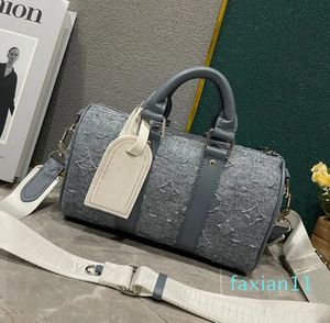 the Tote Bag duffle Faded denim embossing outdoor print stripes letter soft single Top handle cowhide designer luggage bag Duffel Bags