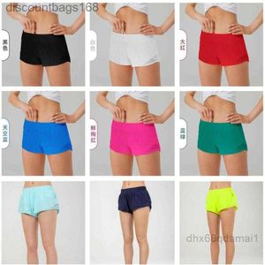 Lulus Summer Yoga Hotty Hot Shorts通気性クイック乾燥スポーツ下着女性ポケットランニングフィットネスパンツプリンセススポーツウェアレギングLU Q0JFG