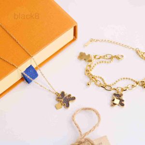 Pendant Necklaces designer Titanium steel antique flower leather pattern red oil dripping flower Cartoon Bear Necklace Fashion ol style clavicle chain DC43