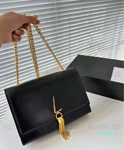 Łańcuchowa torba Tassel Cowhide Kobiety luksusowe projektanci mody torebka gładka skórzana złoty łańcuch crossbody torebki na ramię