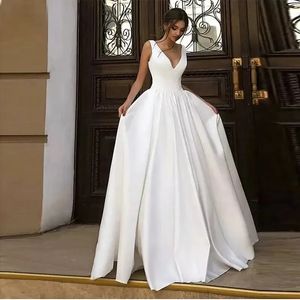 Sexiga strandbröllopsklänningar Lace 2024 ärmlösa pärlor Applices Backless Champagne Bride Dress Bridal Gown Robe de Mariee 01