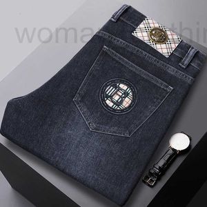 Jeans masculinos designer 2023 outono / inverno grosso fino ajuste reto meados de cintura casual negócios lazer marca elástica 3qh5