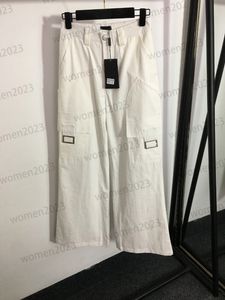 Dżinsowe spodnie o wysokiej zawartości dżinsów z kieszeniem towarowym projektantki Kobiety Panto