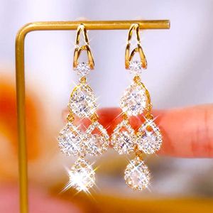 Light luxury and high-end feeling sparkling water drop shaped earrings women's long style tassels unique design earrings exaggerated personality exquisite trend
