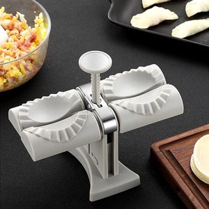 Andere Küchenwerkzeuge Home Dumpling Maker Doppelkopf-Knödelform Automatische Knödelmaschine Kleine Pierogi-Form DIY Küchenwerkzeuge Zubehör 230920