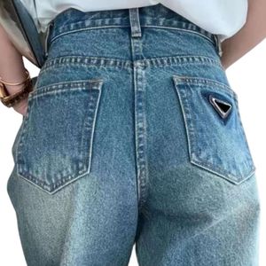 Kvinnors jeans designer mode lyxiga toppkvalitet kvinnor nya jeans byxor med knopp bokstäver stil för lady slim denim pant lång rak blå vintage jean klassiker