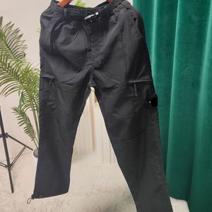 Pantaloni da uomo Primavera Autunno Uomo Designer Pantaloni cargo in pietra Multi tasche in nylon Casual Pantaloni in pietra nera in nylon Pantaloni cargo da donna 230919