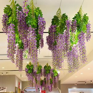 Juldekorationer 12st konstgjorda wisteria murgröna hängande vinstockar faux siden blommor girland lila växt för hem trädgård vägg dekoration 230919