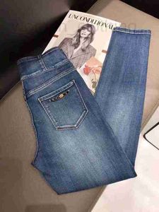 Damen-Jeans-Designer, drei Knöpfe, hohe Taille, schmale Jeans, Damen, europäische neue Schwerindustrie, schlank, kleine Füße, Bleistifthosen-Trend AGYM