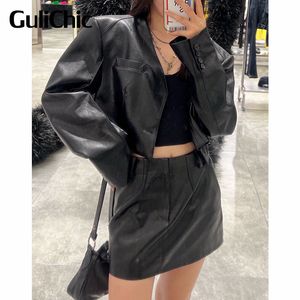 Two Piece Dress 912 GuliChic Women Temperament VNeck Shoulder Pads Hollow Out Back Short PU Leather Jacket Or Skirt Black Set 230920