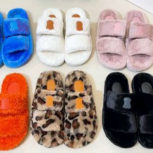 Slides quentes designers sandálias de pele triomphe em shearling mulheres inverno chinelos peludos casa de luxo slide sola de borracha sapatos com caixa no482