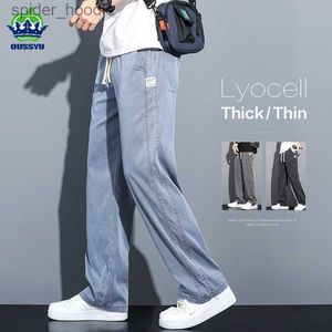 Męskie dżinsy odzież miękka lyocell tkanina męskie dżinsy luźne proste spodnie sznurka elastyczna talia Korea swobodne spodnie Plus 5xl L230927
