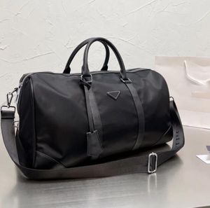Duffel väskor toppkvalitet män mode duffle pås trippel svart nylon resväskor män hanterar bagage gentleman affärs tote med axelband rave recensioner