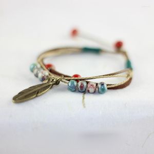 Länkarmband 12 stycken/parti blad charm kvinnliga män keramiska pärlor fjäderhänge smycken smycken läder väv kedja klocka armband