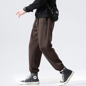 Męskie spodnie M-5xl harem man elastyczne listy talii habirowane Zimowe jesień swobodne spodnie luźne fit streetwear ciepłe ubranie mężczyzna