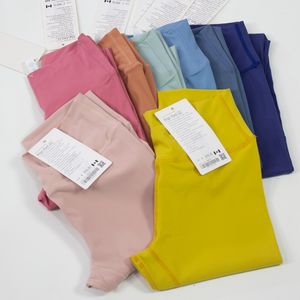 LL Pantaloni da yoga a vita alta Pantaloni da fitness push-up da donna Pantaloni sportivi a forma di T elastici morbidi per l'allenamento della signora 28 colori