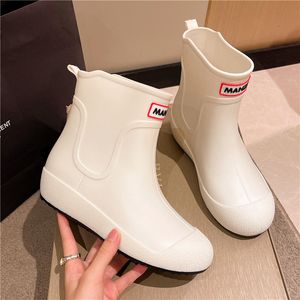 Botas de chuva moda sólida botas de chuva homens borracha casual tornozelo bootie antiderrapante sapatos femininos forro quente sapatos chuvosos para andar na rua 230920