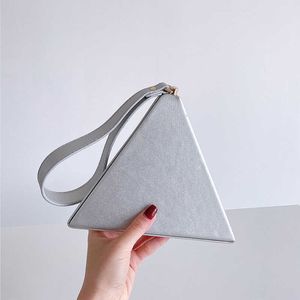 Guling Jingguai luggage 2021 new fashion portable triangle bag women's small fresh hand-in-hand simple net Red Pyramid bag 230921