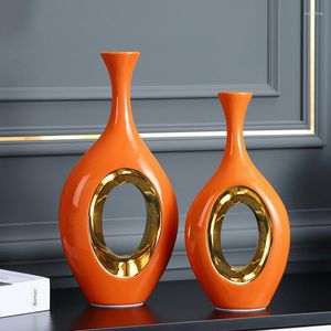 花瓶モダンラグジュアリーオレンジ色のプノンペンセラミック花瓶クリエイティブリビングルームエントランスファミリーデコレーションホローフラワーホーム