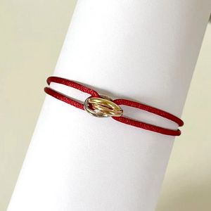 Trinity Ring Armband Lucky Red Rope for Woman Designer Gold Plated 18k T0p Kvalitet Högsta Counter Quality Brand Designer Jycken Jubileumsgåva