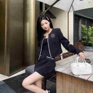 Two Piece Dress designer 23 Years Early Autumn and Winter New Set Women's Fashion High end Wear Full Body Hot Diamond Round Neck Coat Paired with Small A Half Skirt 6T87