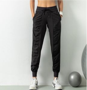 Lu lu calças esportivas respiráveis roupas de ginástica das mulheres corredores secagem rápida magro solto correndo treinamento fitness leggings nove pontos bolso calças casuais alta qualidade