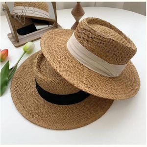 Romantyczna Lady Ribbon Słomowa słoma kapelusz Sunhat Summer Web Celebrity Top Suntan Vacation Beach Travel Skinpy Brim Hats261d